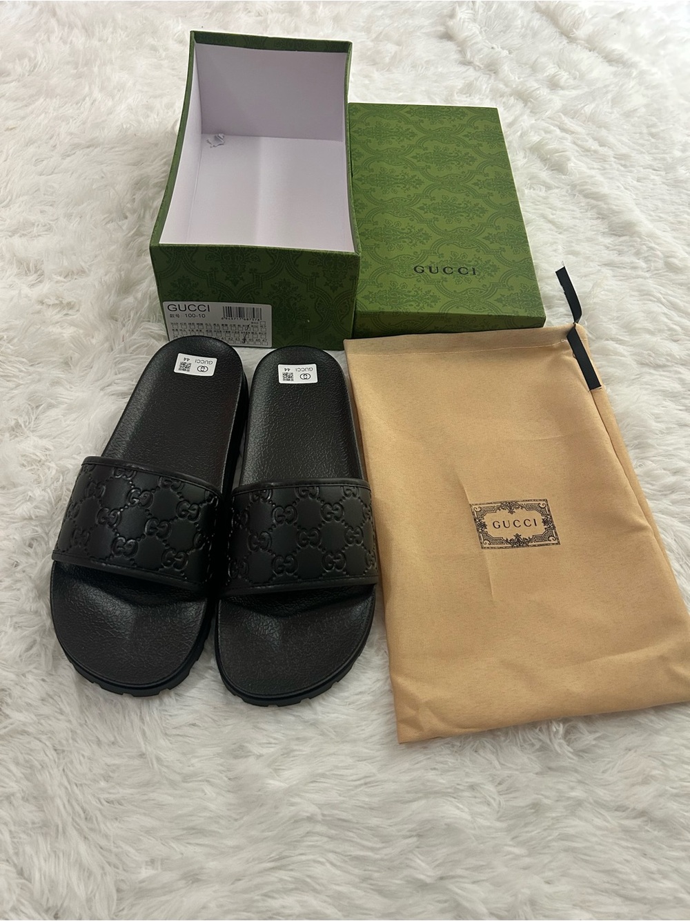Gucci Men’s Black Embossed Interlocking G Slide Sandals